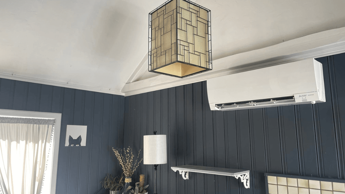 mini-split heat pump on blue wall in Leominster, Massachusetts home