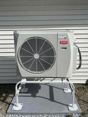 Outdoor mini-split unit installed otuside Manyard, Massachusetts home.